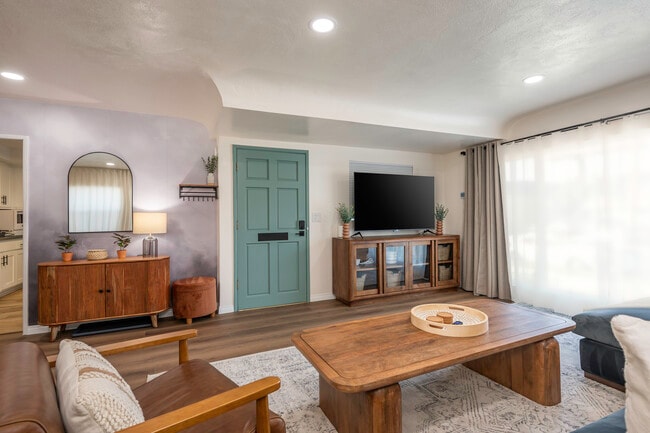 75-inch TV and black-out curtains ideal for an immersive movie/tv series experience anytime - 4746 W 159th St