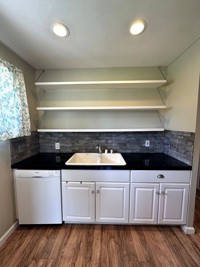 Photo - Cutest 3-Bedroom House with Covered Back Patio + Bonus Storage/Office!