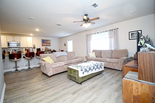 Photo - Modern 5BR/3BA Home in Birch Run with Solar Panels, Open Concept Design & Bonus Living Space