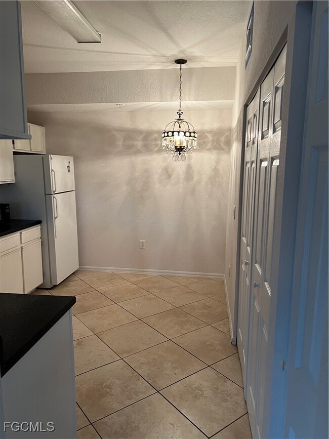 Building Photo - 6461 Aragon Way Unit 208