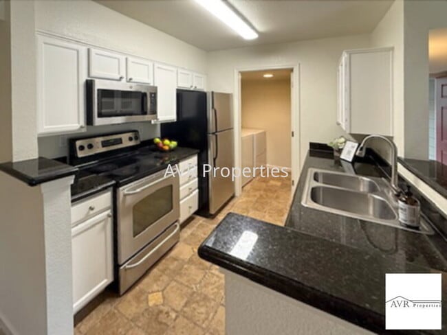 Photo - Luxury upstairs home overlooks with water views from every window and the balcony