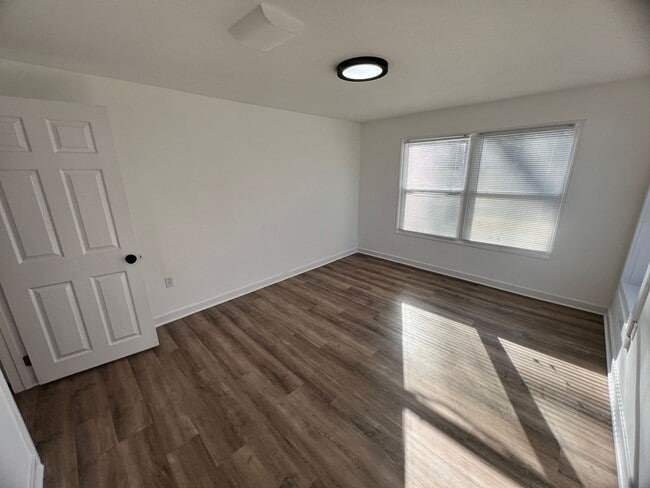 Photo - Cozy 1-Bedroom Triplex Unit with New Appliances