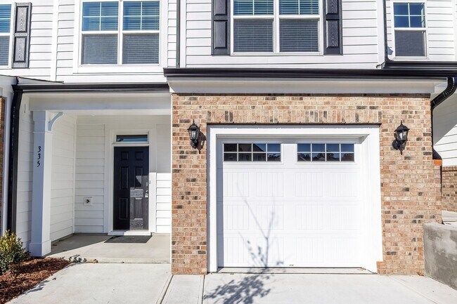 Photo - Updated Townhome with 1 Car Garage - close to Southpoint!
