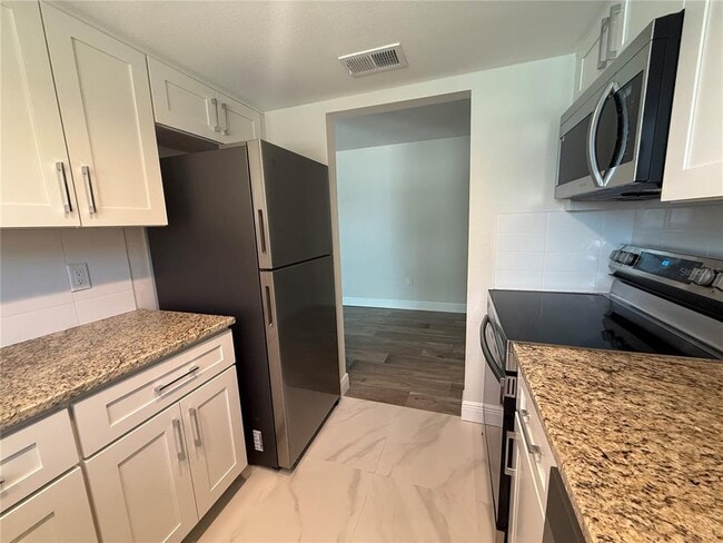 Photo - 14120 Palm St Unit 103