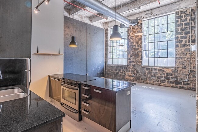 Building Photo - Authentic Loft Living w/ views of Ponce Ci...