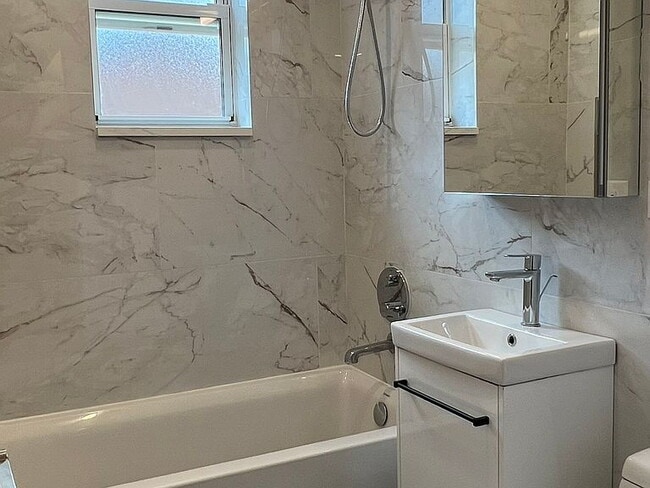 Photo - "Charming Sunnyside Retreat: 1-Bedroom Haven with Elegant Granite & Hardwood Touches!"