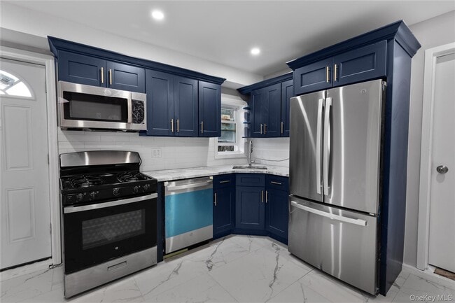 Photo - 840 E Broadway Unidad lower