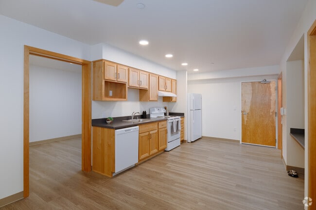2BR 1BA - 709SF - Kitchen & Living Room