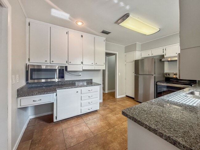 Photo - Spacious 4 Bed 2.5 Bath Home with 2-Car Garage & Fenced Yard in Jacksonville, FL