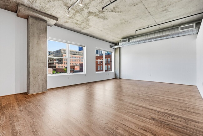 Building Photo - 1499 Blake St Unit Authentic LoDo Loft