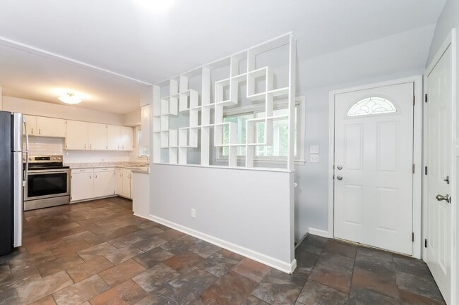 Photo - 3 BR/1.5BA | Newly Renovated Single Family Home | 1-Car Garage Parking | Gated backyard