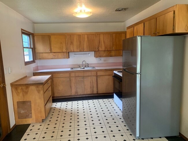 Photo - $2,500 Three Bedrooms, One Bath Home with Private Back Yard, Ready To Lease!