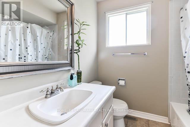 Photo - 166 McNicoll Ave