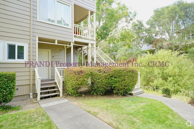 Building Photo - Modern Ground Floor Condo with 2 Car Garage!