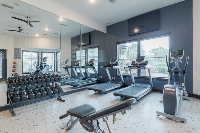 Our fitness center is equipped with a variety of machines: elliptical, treadmill, stairstepper, squat machine, cable and resistance machines, yoga balls, bike, and free weights