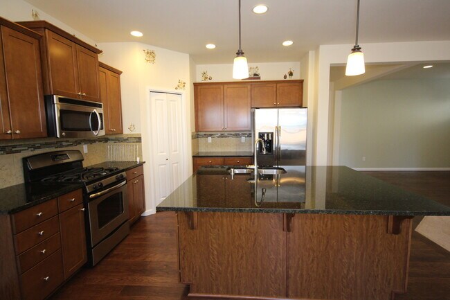 Photo - Beautiful Family Home with Bonus Room, Storage & Fenced Yard