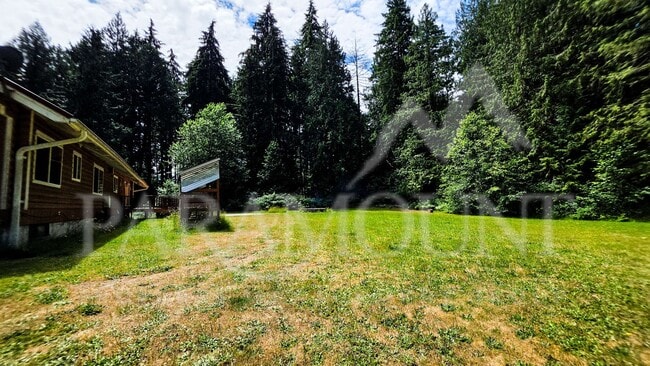 Photo - Spacious Log Home with Acreage!