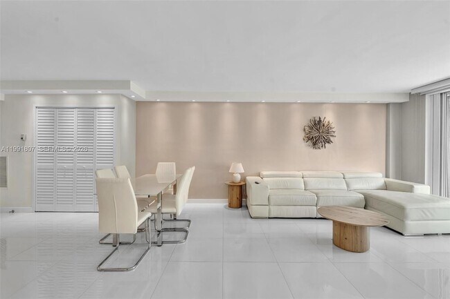 9195 Collins Ave Unit 303