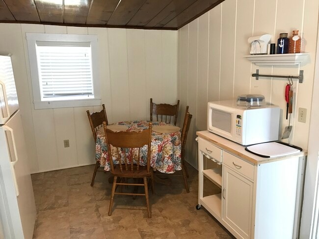 eat-in kitchen with stack laundry