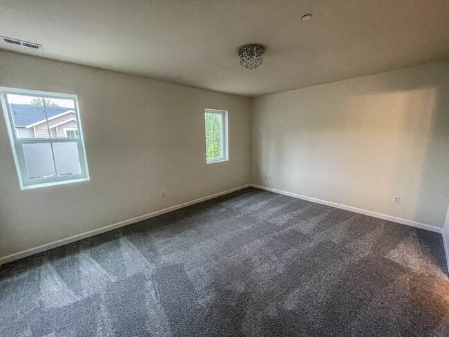 Photo - 3 Bed 2.5 Bath 2 Car Garage 1493sf Low maintenance yards. Prime Location.