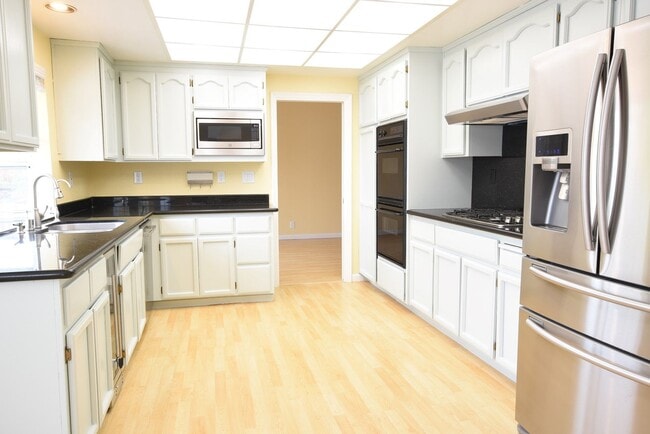 Photo - Beautiful 4 Bedroom 3 Bath Evergreen Home with Stunning Spacious Backyard!