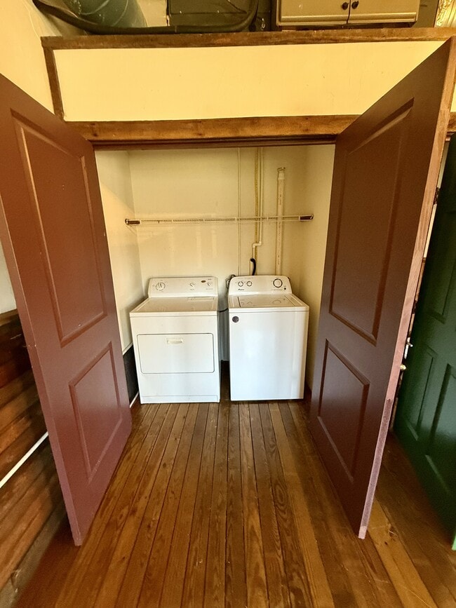 washer and dryer off living room - 628 W Market St