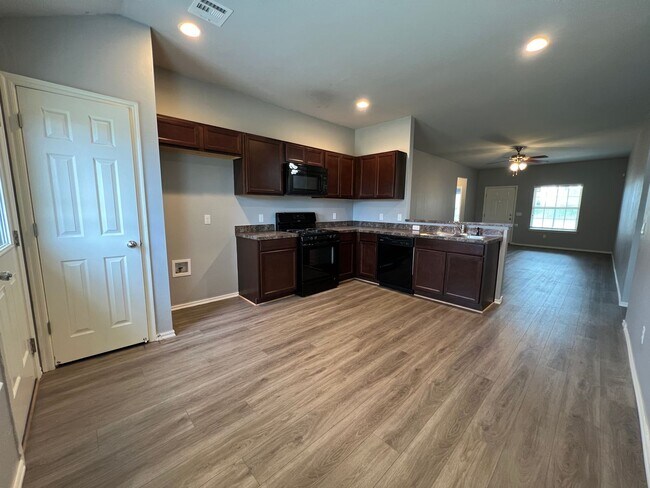 Photo - $500 OFF FIRST MONTHS RENT! Home with abov...