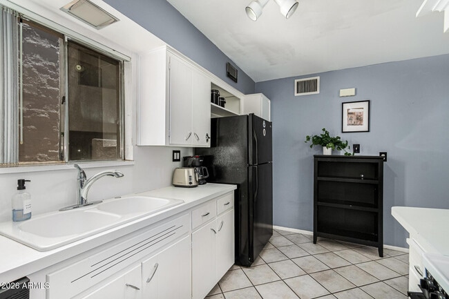 Photo - 6824 E 2nd St Unit 113