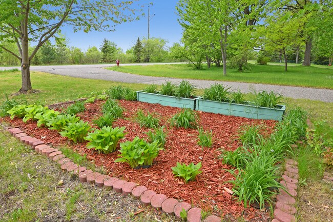 Plenty of space for gardenng or planting your favorite flowers- make it your own oasis! - 32584 River Vista Ln