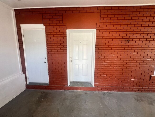 Photo - Stylish 2-Bedroom Unit Featuring Decorative Fireplace