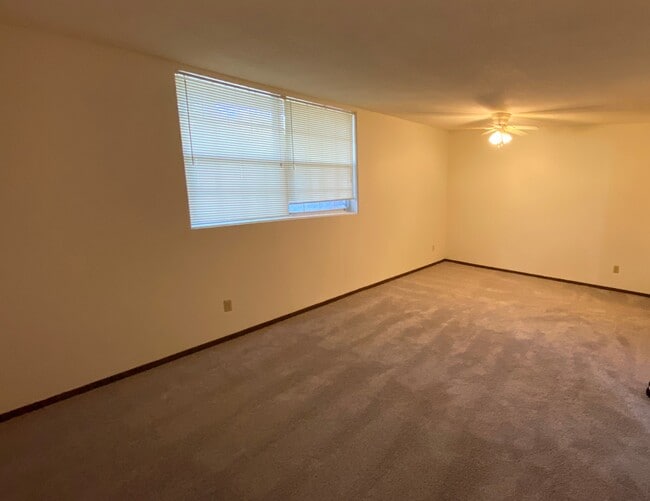 Tradition 1 Bed - Living Area - Versailles Apartments