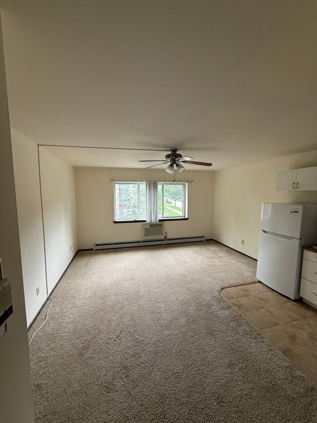 Building Photo - 2605 N Frederick Ave Unit 215