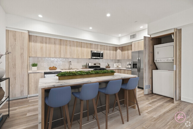 Open-Concept Kitchen with Stainless-Steel Appliances and In-Suite Washer & Dryer - Jayne Floor Plan - Tamarind Fountain Rental