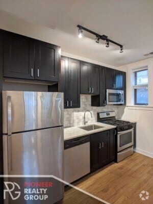 Building Photo - 2211 W Eastwood Ave Unit 3 Rental
