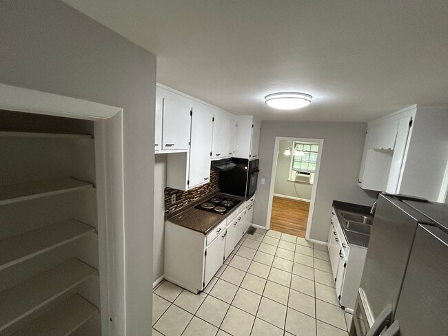 Photo - Charming 3BR Home with Bonus Den, Hardwood Floors & Fenced Backyard