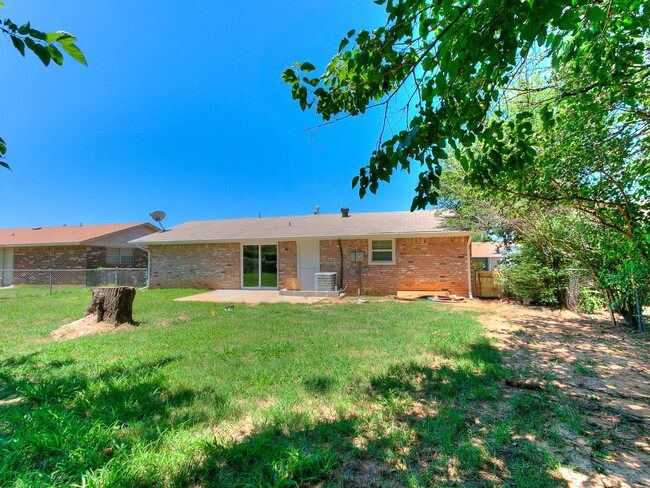 Photo - 4 Bedroom/2 Bath home with fenced yard.