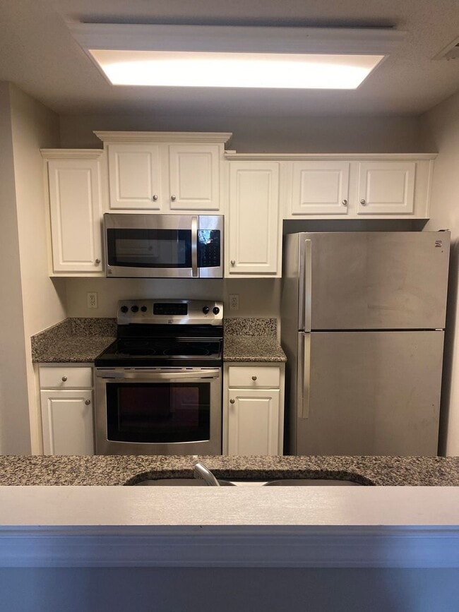 Photo - Harborview 2-Story Townhouse with Spacious Layout & Community Pool Access