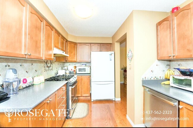 Photo - Spacious 3-Bedroom + Den, 1.5-Bath Home in... Unit 1
