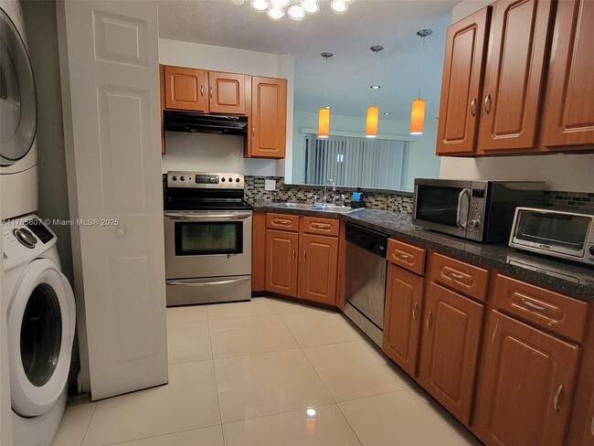 Photo - 3409 NW 44th St Unidad 103 Rental