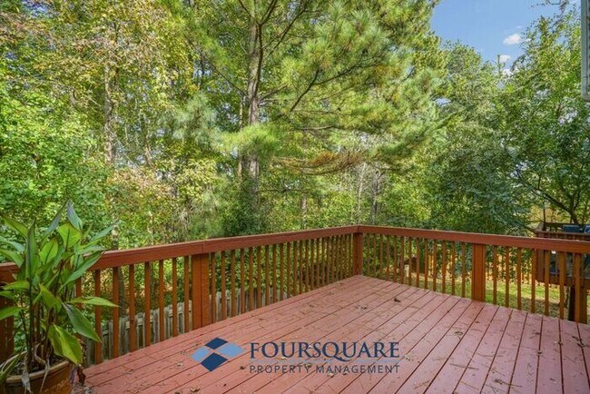 Photo - Lakefront Townhome with 1st Floor Bedroom, Fireplace & 2-Car Garage – In Raleigh
