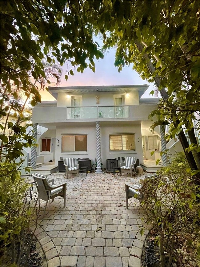 Building Photo - 8036 Harding Ave Unit 1