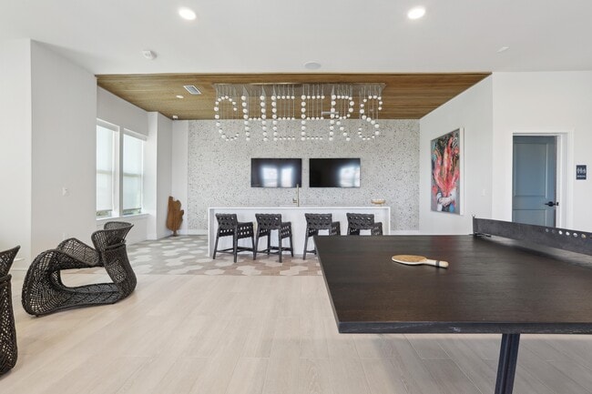Social Lounge with TVs, Games, and Relaxing Spaces