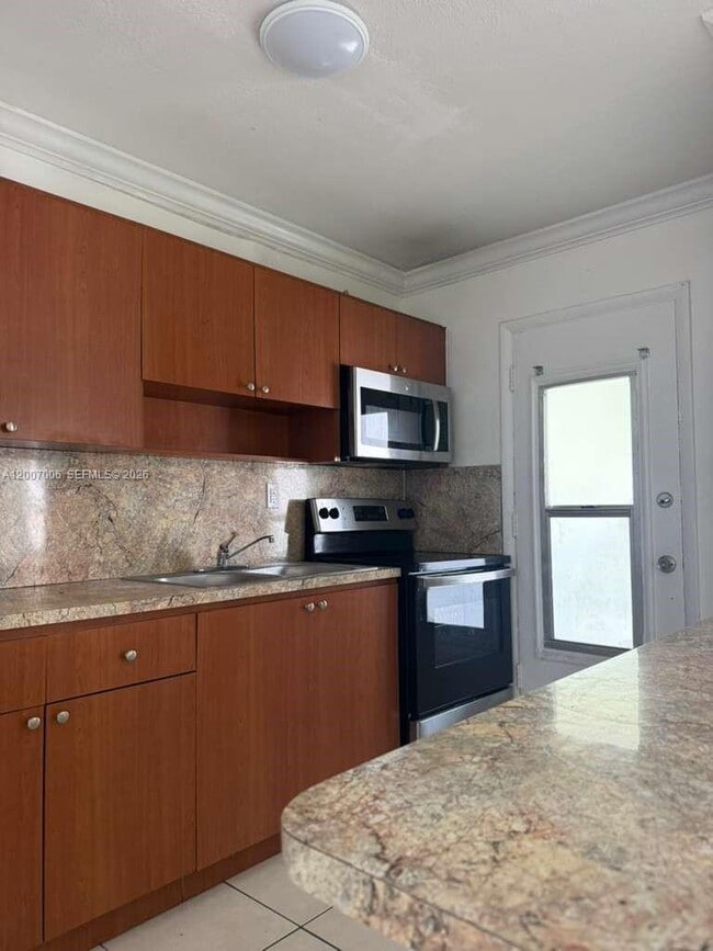 Building Photo - 890 NW 45th Ave Unit 25