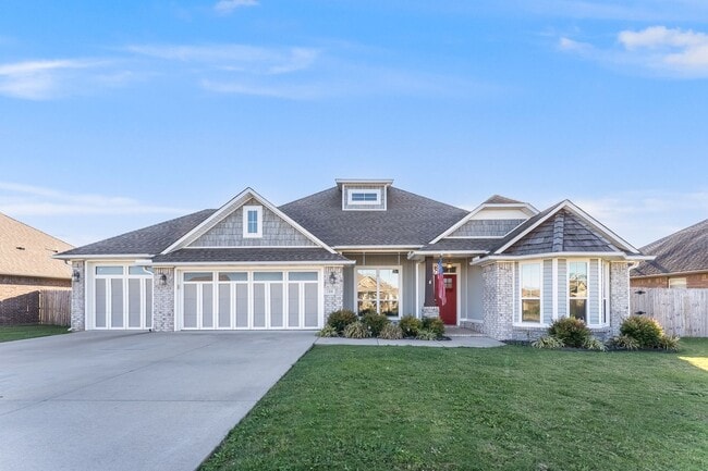 Building Photo - Welcome to this stunning 4-bedroom, 2-bath...