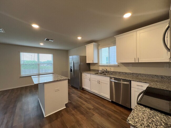 Photo - Like-New 4BR Home w/ Huge Backyard + W/D Included | $500 Move-In Credit
