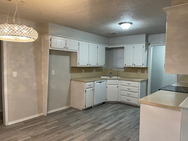 Photo - 3/2 - Moore Schools