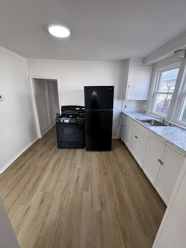 Photo - "Spacious 4-Bed, 3-Bath Home on South Poplar Street – 1758 Sq Ft of Comfort in Wichita!"