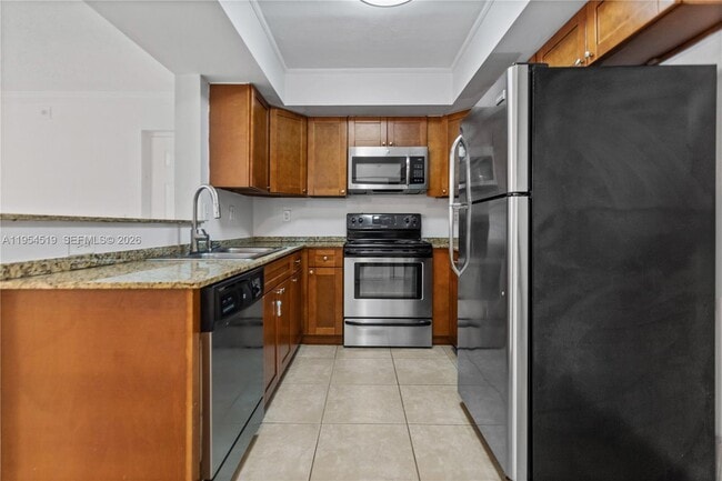 Building Photo - 5520 NW 61st St Unit 202