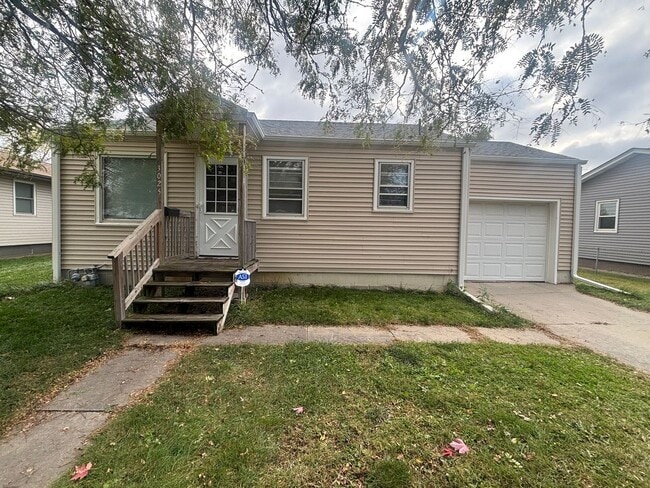 Building Photo - West-End Home with Garage & Large Backyard