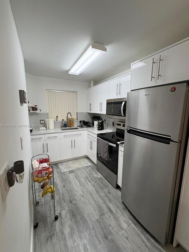Photo - 1750 W 46th St Unit 312
